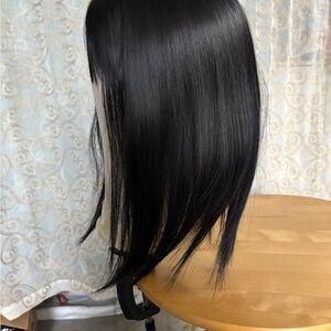 Sleek Black Women's Wig
Brand new
12 to 14 inches 
Light volume